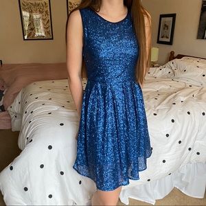 Fit and flare blue sequined dress